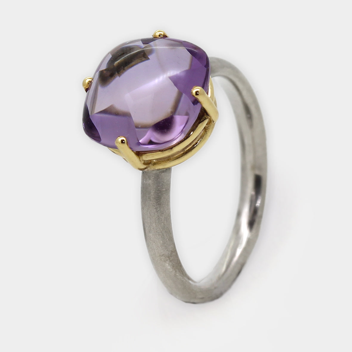 Silberring mit Amethyst in Goldfassung