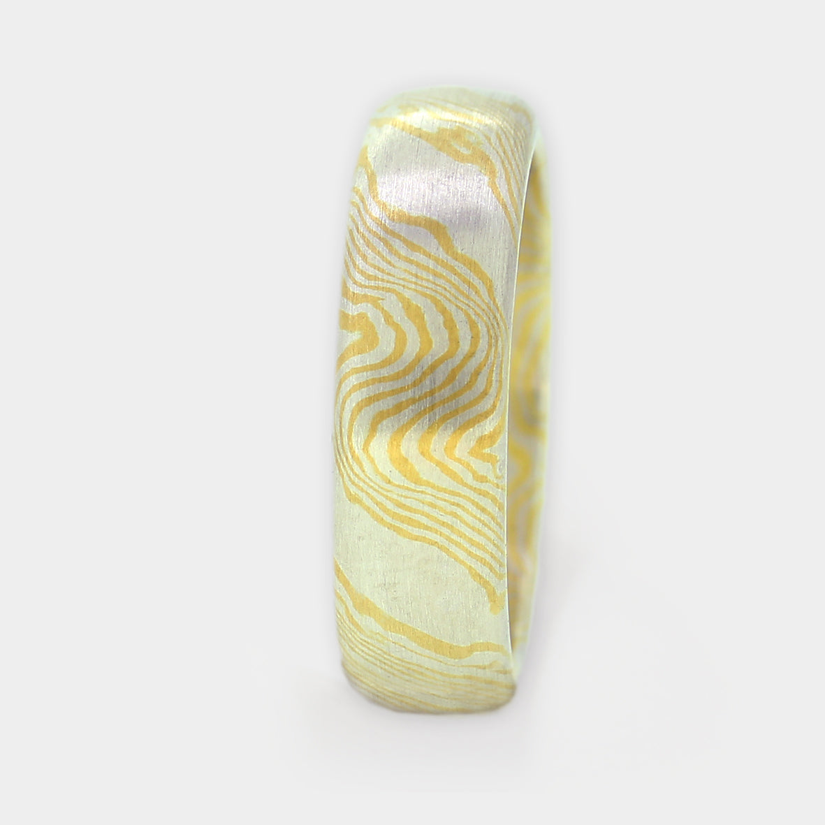 Mokume Gane Ring, Wellen und Linien in Silber und Gold