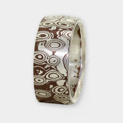 Wilde Augen in Kupfer / Silber