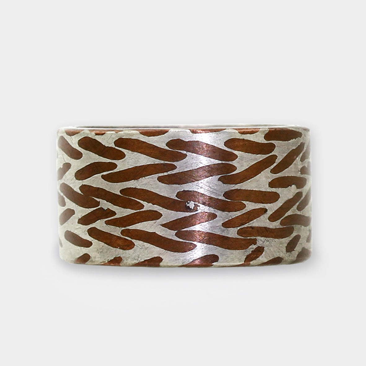 "Fischgrätmuster" in Kupfer / Silber